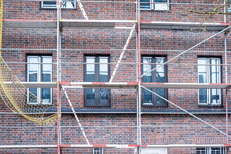 House construction site with scaffolding