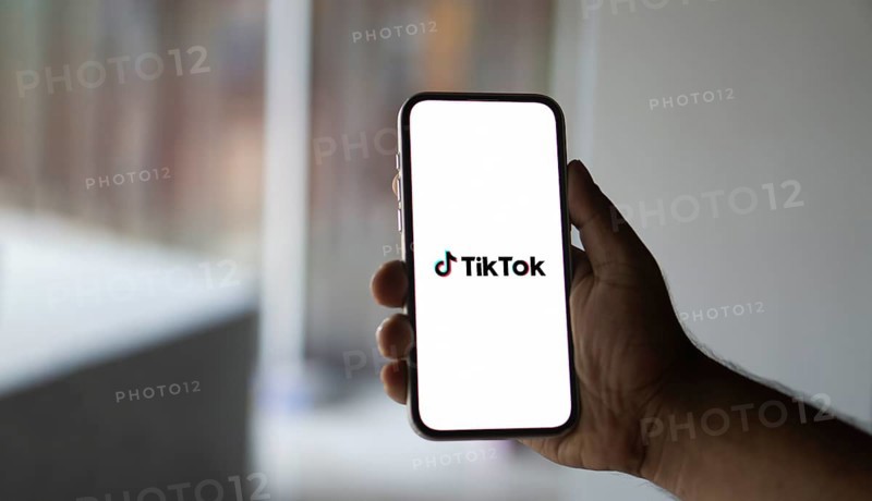 Tik Tok logo on smartphone