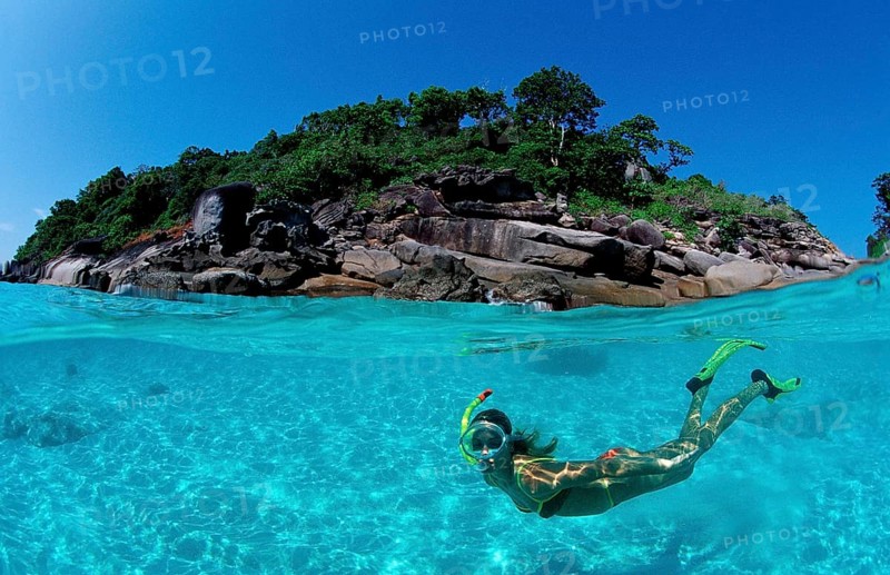 Snorkellers in front of tropical island, Similan Islands, Andaman Sea, Phuket, Thailand, Asia