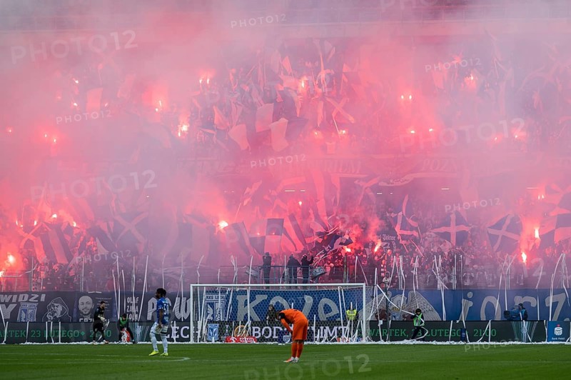 POZNAN, POLAND - FEBRUARY 19, 2023: Football match Polish PKO Ekstraklasa between Lech Poznan vs KGHM Zaglebie Lubin 1:2. Supporters of Lech burns flares.