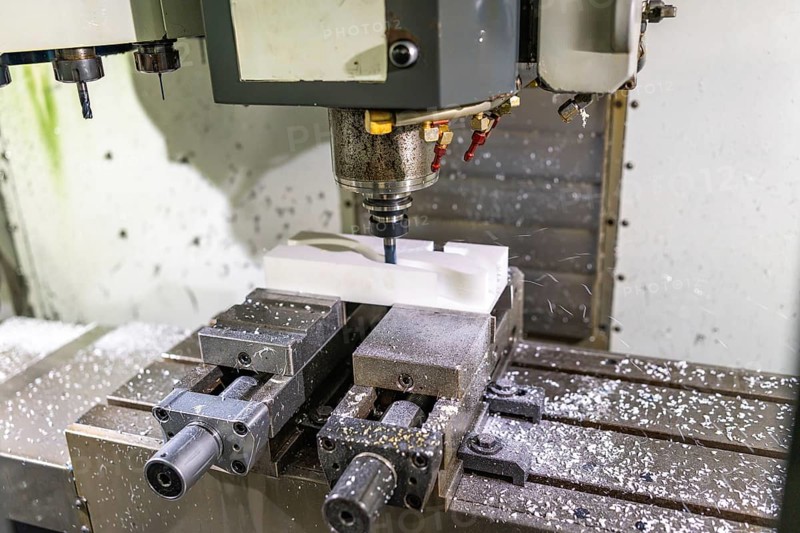 Close-up of a mechanical machine to mold plastic parts with no people
