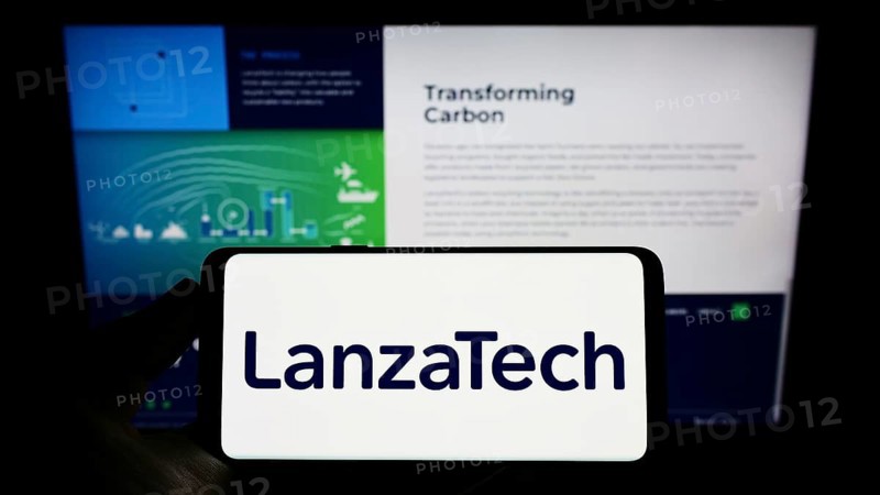 Stuttgart, Germany, 03-12-2022: Person holding cellphone with logo of US carbon recycling company LanzaTech Inc. on screen in front of business webpage. Focus on phone display, Europe