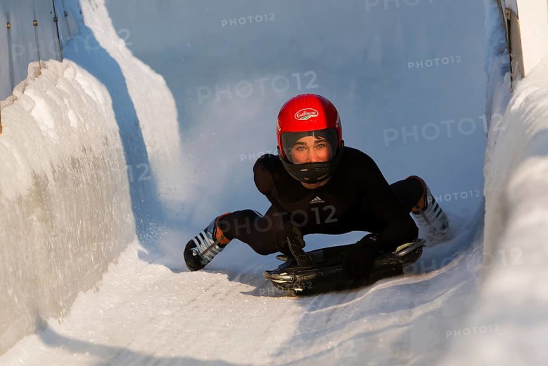Person riding a skeleton sled at the Innsbruck bobsleigh track, Igls Olympic Bobsled Run, Igls, Innsbruck, Tyrol, Austria, Europe