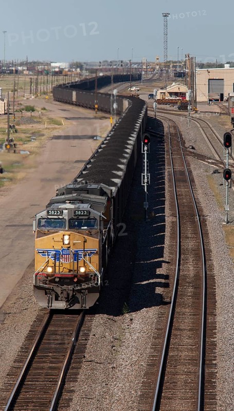 North Platte, Nebraska - An eastbound train hauling coal from western strip mines passes through the Union Pacific Railroad's Bailey Yard, the largest rail yard in the world. The yard handles 14, 000 rail cars every day. The yard's operations are visible from the the UP's eight-story Golden Spike Tower and visitor center.