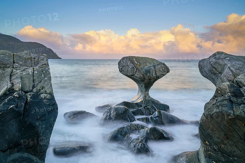 Kannesteinen at sunrise, clouds and blue sky, North Sea, Oppedal, Vågsøy, Norway, Europe
