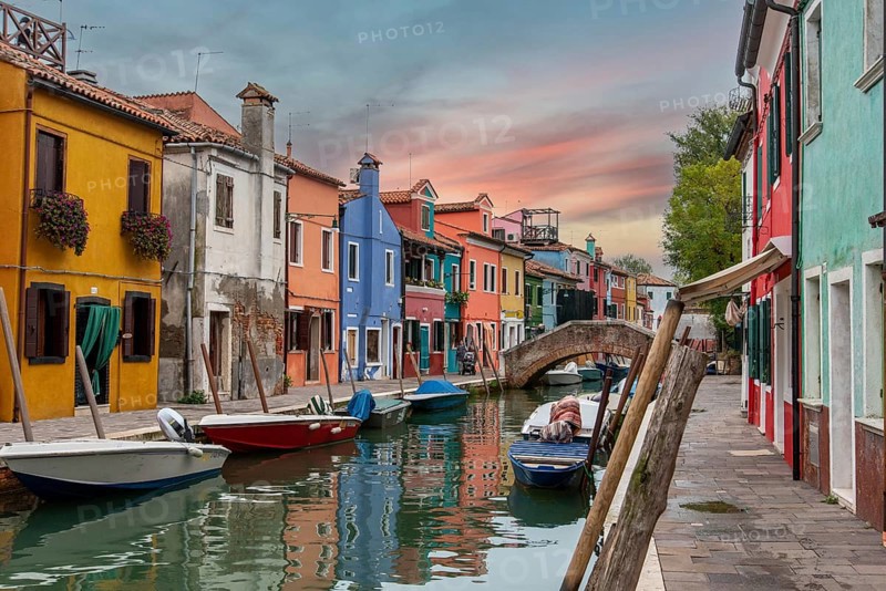 Colorful Houses in Burano beneath a scenic sky, Island of Venice, Italy, Europe