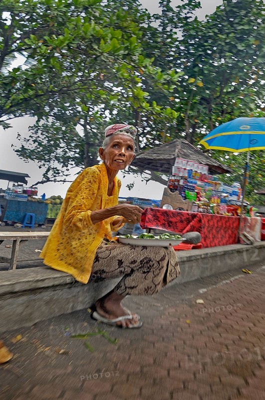 Old lady selling drinks near Amed, Bali, Indonesia, Asia