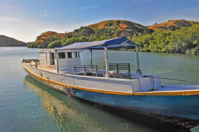 Simple typical wooden boat at the jetty, Rinca Island, Loh Buaya, Komodo National Park, Indonesia, Asia