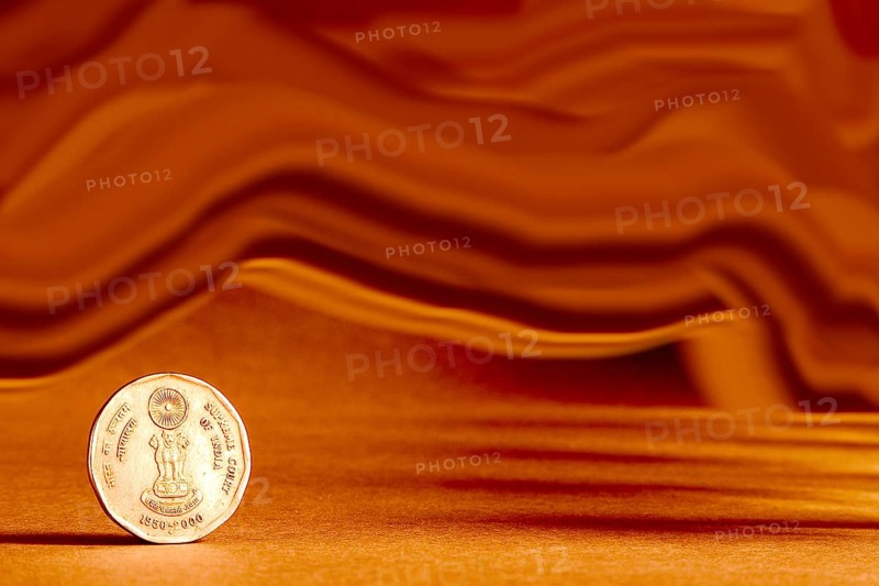 One single Indian currency two rupees coin and artistic background backside embossed Ashoka Pillar national symbols state emblem and supreme court of India 1950-2000