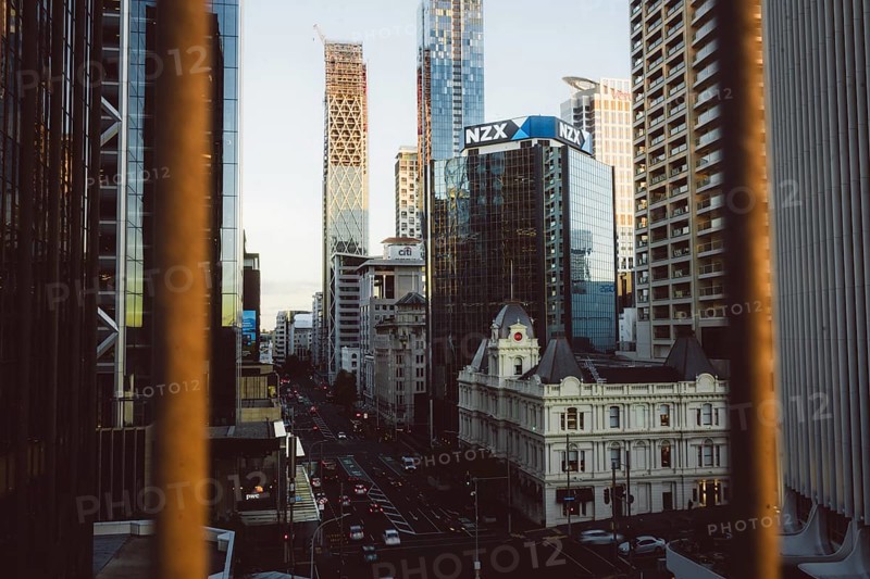 View of a busy street with the modern NZX skyscraper in the background, new zealand stock exchange, Auckland, New Zealand, Oceania