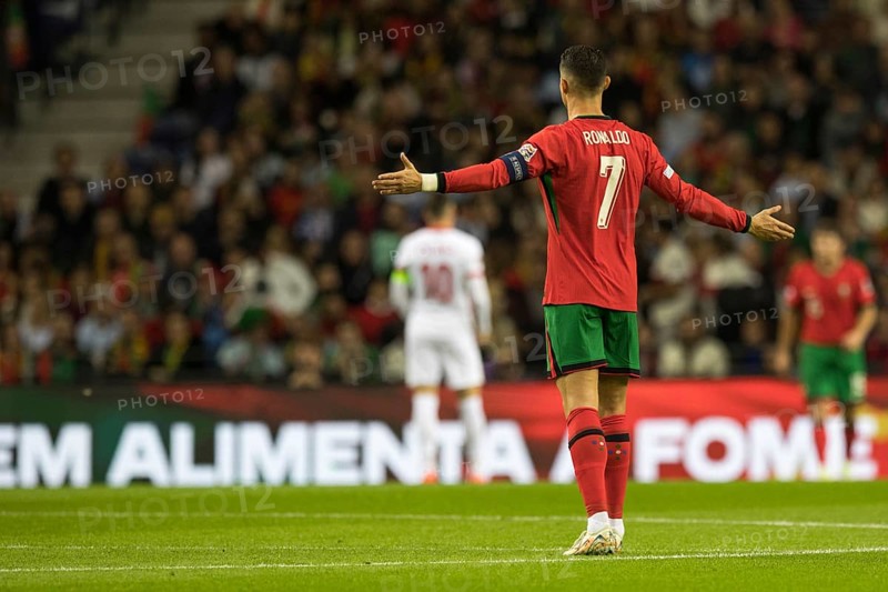 Football match, captain Cristiano RONALDO CR7 Portugal with raised arms looking from behind with shirt number seven, Estadio do Dragao, Porto, Portugal, Europe