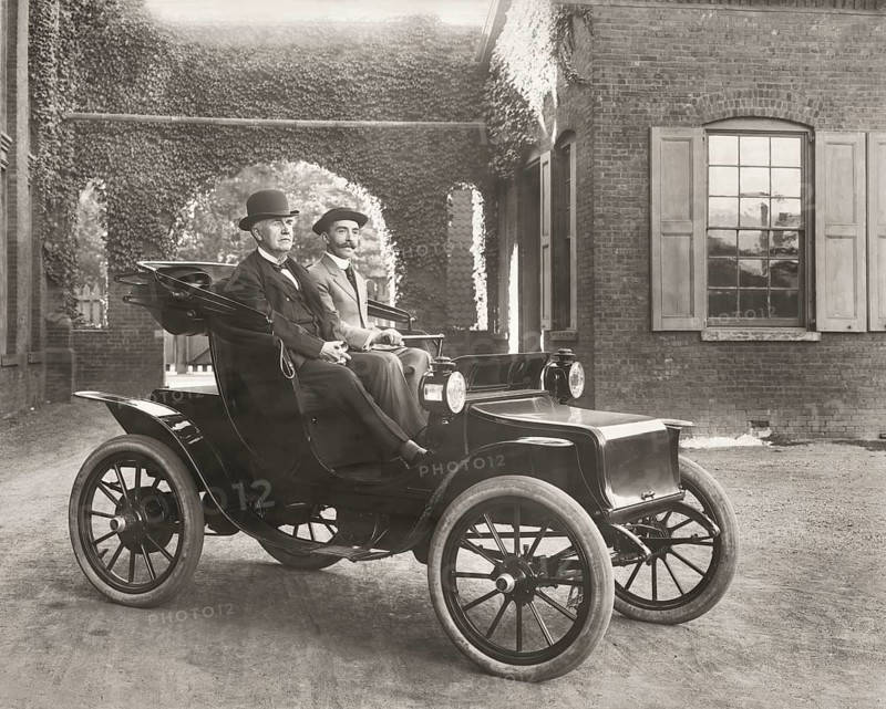 Thomas Edison and Mr. Greenfeldt in a Baker electric automobile, 1910, digitally edited