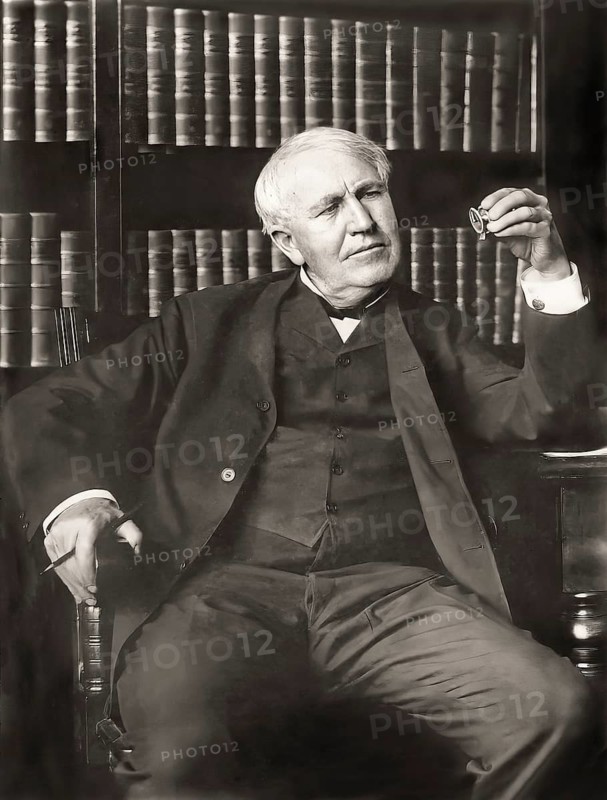 Thomas Alva Edison examining his phonograph recording apparatus, digitally edited