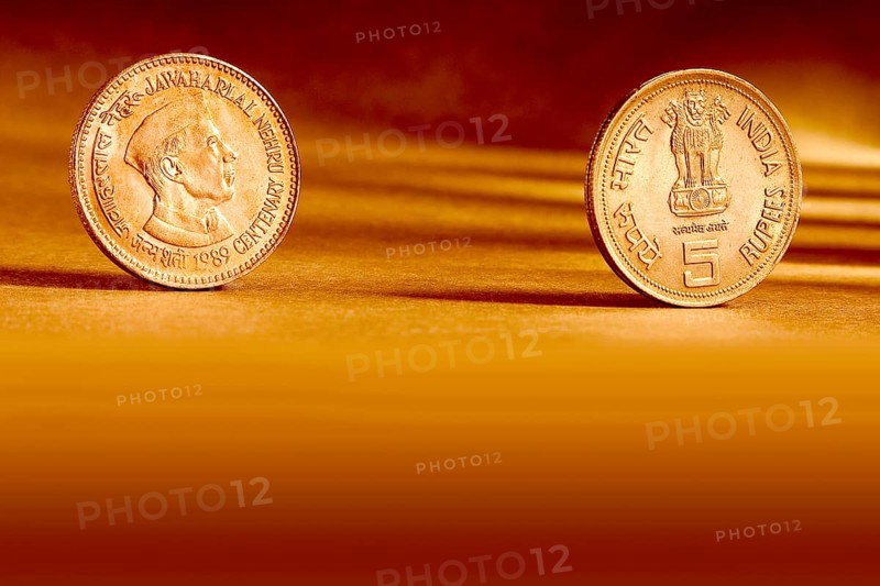 Double pair Indian currency five rupees coin front side and backside manner embossed Jawaharlal Nehru centenary 1989 on orange background