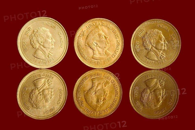 Three Indian currency five rupees coins with reflection backside embossed in middle Jawaharlal Nehru centenary 1989 left and right Indira Gandhi 1917-1984