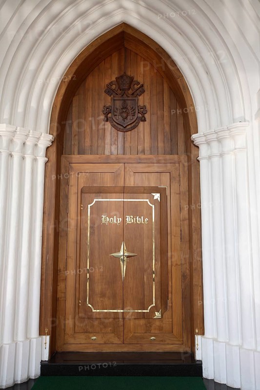Main door of Bible tower at the rear of Shrine Basilica of Our Lady of Dolours built in1940, Thrissur, Kerala, India, Asia