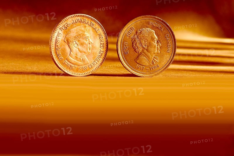 Double pair Indian currency five rupees coin front side and backside manner embossed Jawaharlal Nehru Centenary 1989 & Indira Gandhi 1917-1984 on orange background