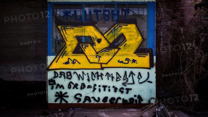 Accidental graffiti on a wall of an abandoned building, Gerresheimer Germany, Lost Place, Glashütte Gerresheim, Düsseldorf Gerresheim, North Rhine-Westphalia, Germany, Europe