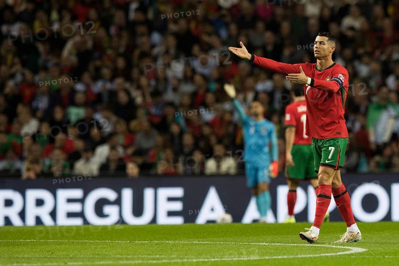 Football match, captain Cristiano RONALDO CR7 Portugal right with both arms pointing up and left with eyes looking to the left, in the background goalkeeper Diogo COSTA Portugal with his left arm raised and claiming, Estadio do Dragao, Porto, Portugal, Europe