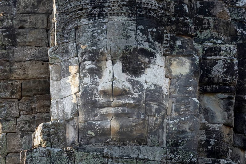 Giant stone-carved face of the Bodhisattva Lokeshvara, also known as Avalokiteshvara, Bayon Temple, Angkor Thom, UNESCO World Heritage Site, Angkor Wat, Siem Reap, Cambodia, Asia