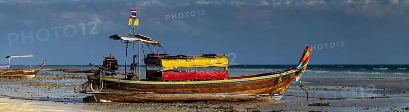 Longtail boat on the beach, at low tide, Koh Ngai Island, Andaman Sea, Satun Province, Southern Thailand, Thailand, Asia