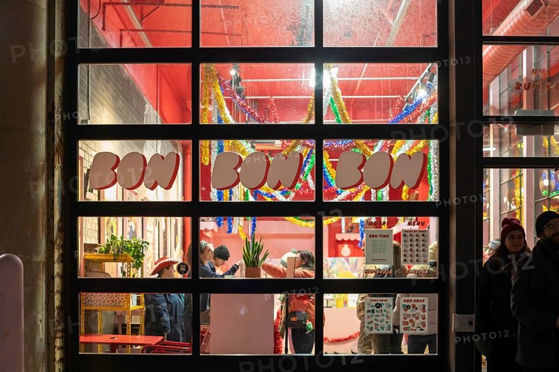 Detroit, Michigan - People buy chocolates at the Bon Bon Bon store on Noel Night. The annual Noel Night at the start of the holiday season in Detroit features open houses by arts and cultural institutions, churches, and small businesses.