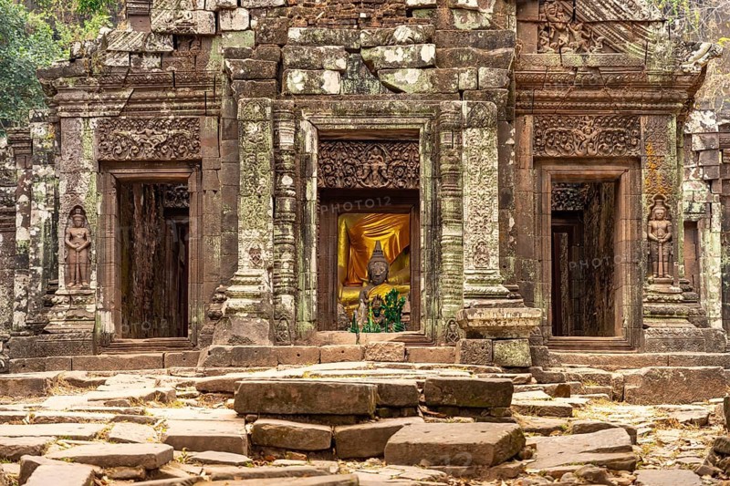 Modern Buddha statues in the central sanctuary of the mountain temple Wat Phu, Champasak province, Laos, Asia