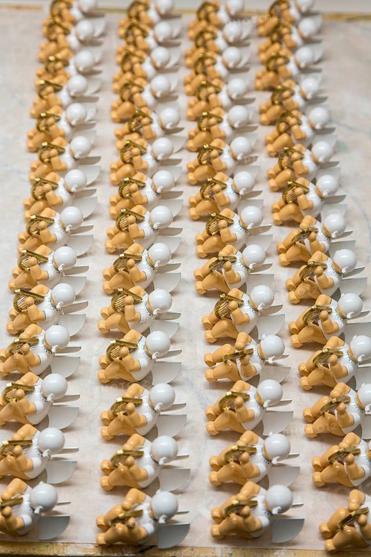 Angel figurines drying between different stages of painting, in the Wendt & Kühn world in Grünhainichen, Erzgebirge, Saxony, Germany, Europe