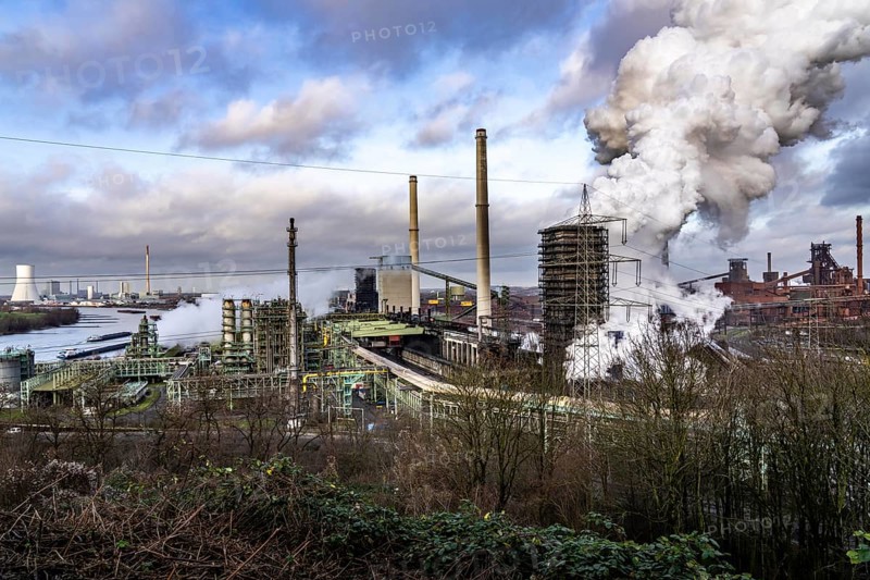 The Thyssenkrupp Steel steelworks in Duisburg-Marxloh, on the Rhine, coking plant unloading tower, blast furnaces 1 and 2, right, STEAG Walsum coal-fired power station, left, North Rhine-Westphalia, Germany, Europe