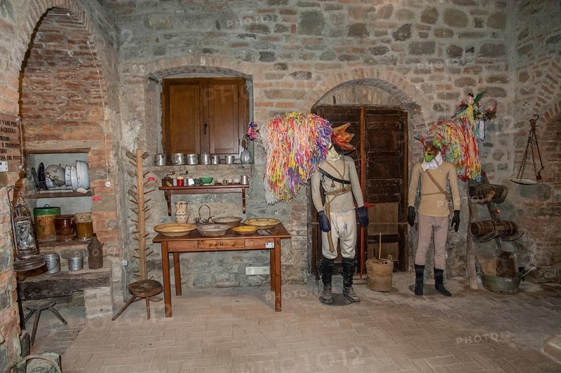 Interior with folk costumes in museum in Aliano, the very poor village in southern Italy that the writer Carlo Levi depicted in his book Christ stopped at Eboli. The book became a bestseller and was filmed. Aliano, Matera District, Basilicata, Italy, Southern Europe, Europe