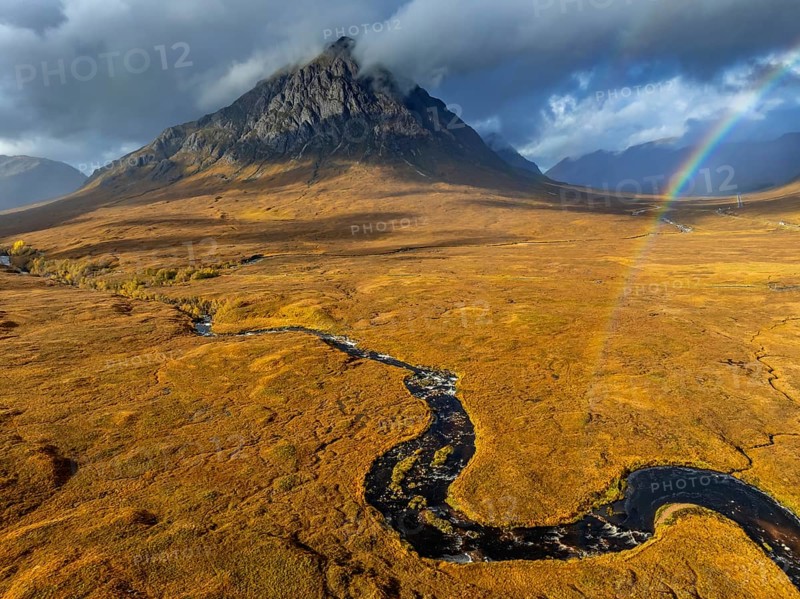 Morning light, cloudy mood, river, moor, mountain landscape, aerial view, rainbow, autumn, view of Buachaille Etive Mòr, Glencoe, Scottish Highlands, Scotland, Great Britain