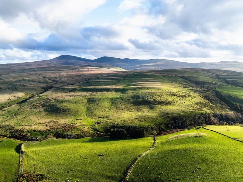 Farms over Black Mountain from a drone, Brecon Beacons National Park, Carmarthenshire, Wales, England, United Kingdom, Europe
