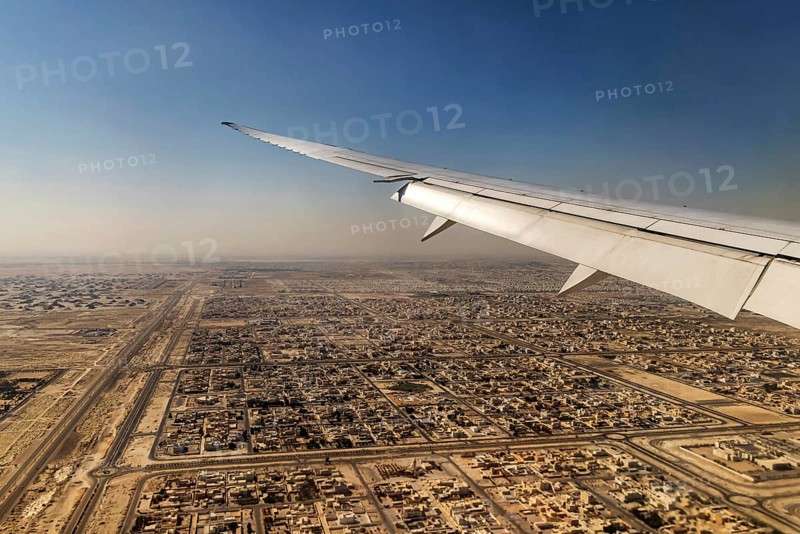 Landing approach over the desert to Abu Dhabi with the airline Etihad. View from the window of a Boeing 787 aircraft. Abu Dhabi, United Arab Emirates, UAE, Southwest Asia, Asia