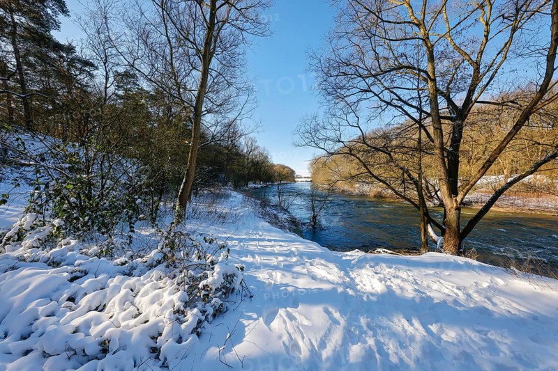 Marl, North Rhine-Westphalia, Germany - Sunny winter landscape in the Ruhr area, ice and snow on the river Lippe