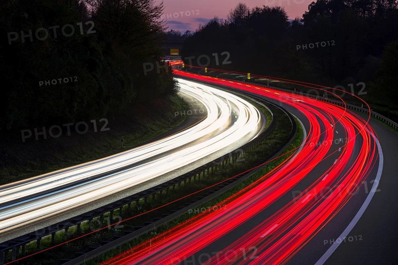 Light traces of cars on a motorway at night in a bend, Winnenden, Baden-Württemberg, Germany, Europe