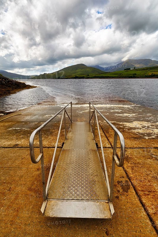 Empty jetty, Killary Harbour, fjord, rain clouds, Connemara, Galway, Wild Atlantic Way, Ireland, Europe