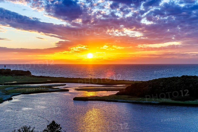 Sunset by the sea on the Baltic Sea in Heiligenhafen, Germany, Europe