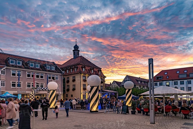 Sunset at the market square during the Shopping Lights event in Neckarsulm, Baden-Württemberg, Germany, Europe