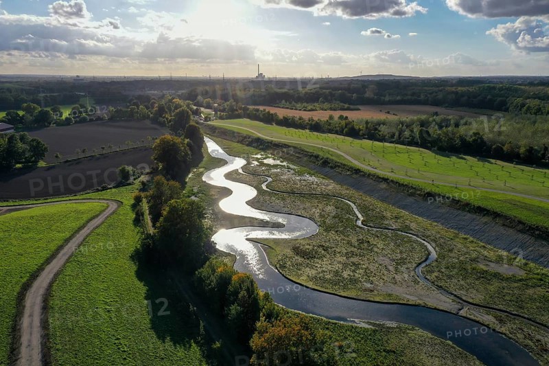 Recklinghausen, Castrop-Rauxel, North Rhine-Westphalia, Germany, Renaturalised Emscher, EMSCHERLAND construction project, a 37-hectare water and nature discovery park at the water crossroads of the Rhine-Herne Canal and the renaturalised Emscher on the city limits of Recklinghausen and Castrop-Rauxel. The ecological focal point at the confluence of the Suderwicher Bach and Emscher will also be a future garden for the International Garden Exhibition 2027. Before the renaturalisation, the Emscher river system was an open, above-ground wastewater channel, combined sewer with surface water and wastewater, Europe