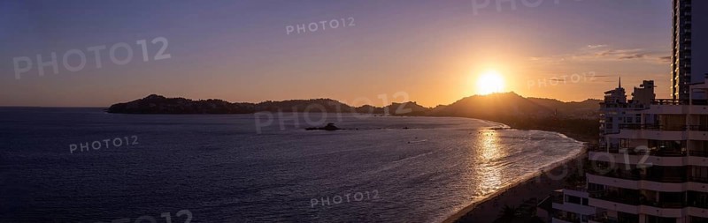 Mexico, Acapulco resort sunset beaches and scenic ocean views near Zona Dorada Golden Beach zone., Central America