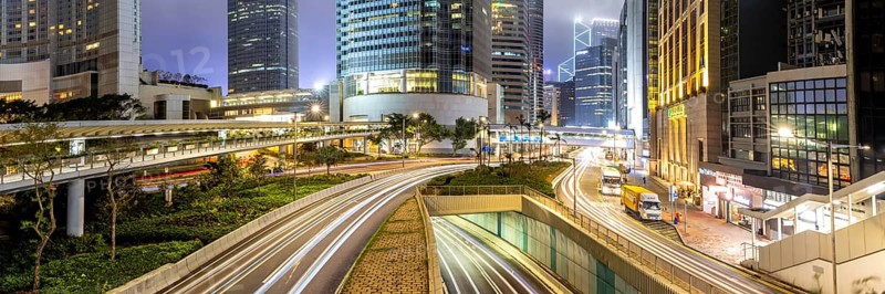 Hong Kong at night traffic with streets and skyscrapers panorama in Hong Kong, China, Asia