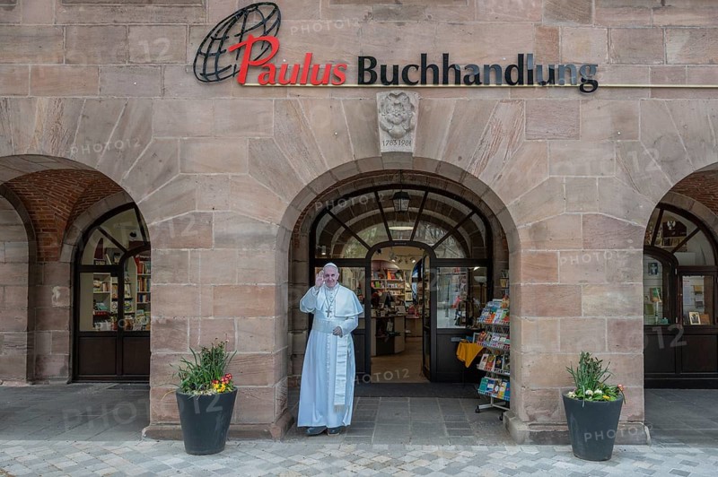 Life-size statue of Pope Francis in front of the Paulus bookshop, Nuremberg, Middle Franconia, Bavaria, Germany, Europe