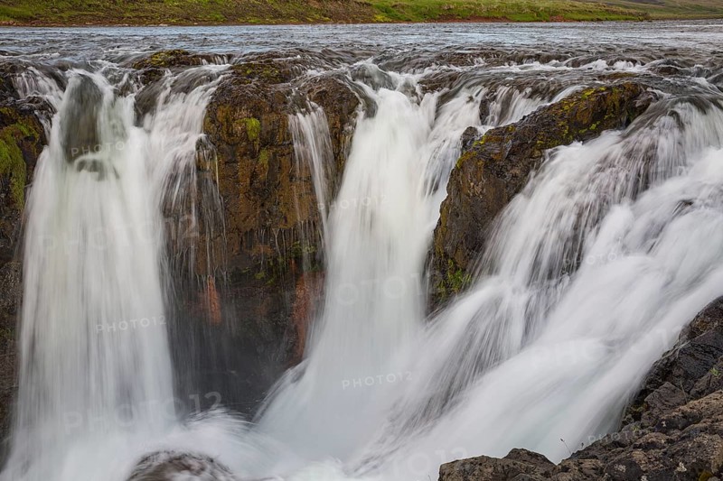 The Kolufossar waterfalls of the river Vididalsa consists of 3 falls the upper fall Efrifoss, in the middle Kolufoss and the lower fall Nedri-Kolufoss. Located in NW Iceland