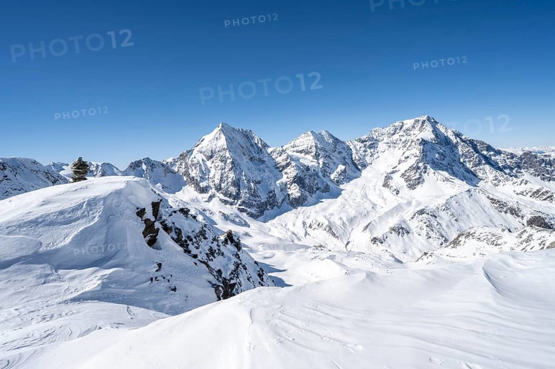 Mountain panorama with snow-covered mountain landscape in winter, view of mountain peaks Königsspitze, Monte Zebru and Ortler, summit of Madritschspitze, Ortler Alps, Vinschgau Valley, Italy, Europe