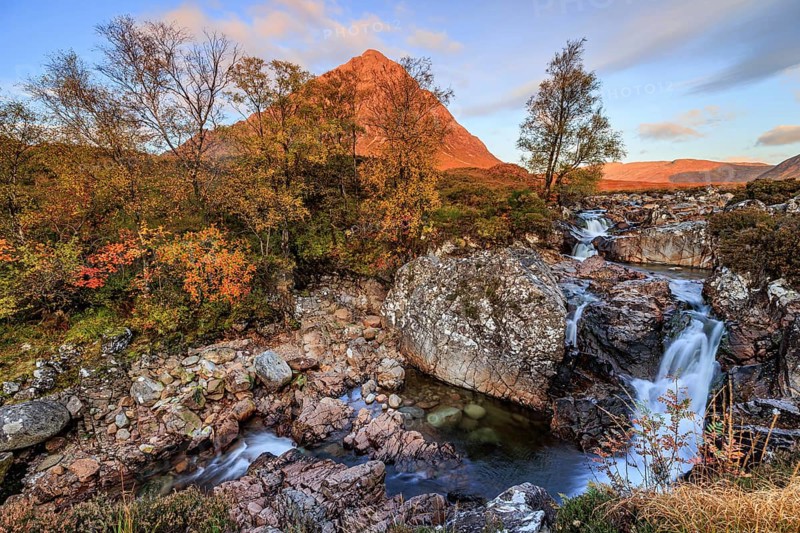Wild river, waterfall, autumn colours, morning light, mountain landscape, cloudy mood, Buachaille Etive Mòr, Glencoe, Scottish Highlands, Scotland, Great Britain