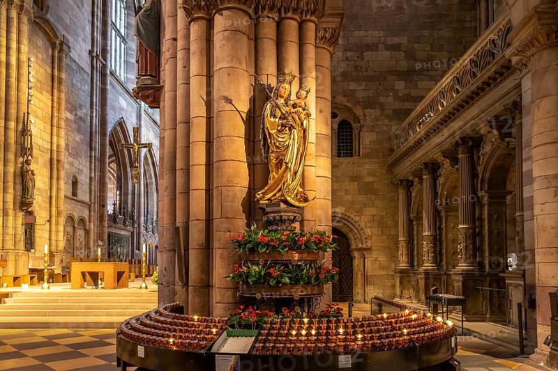 Madonna and sacrificial candles in the interior of Freiburg Minster, Freiburg im Breisgau, Black Forest, Baden-Württemberg, Germany, Europe