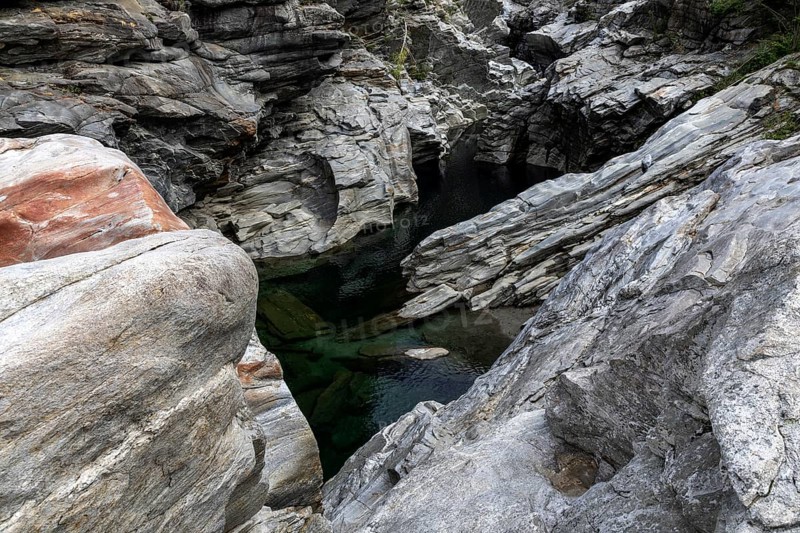 Rocks, granite rock formations in the Maggia River near Ponte Brolla, in the Maggia Valley, Valle Maggia, Canton Ticino, Switzerland, Europe