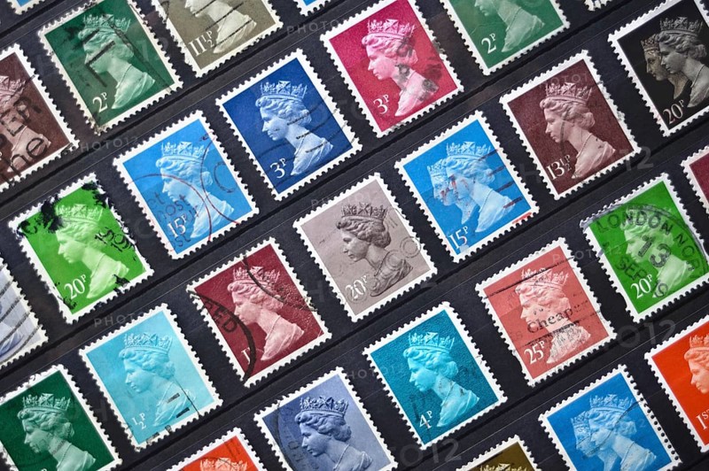 Old British postage stamps depicting the queen Elizabeth II
