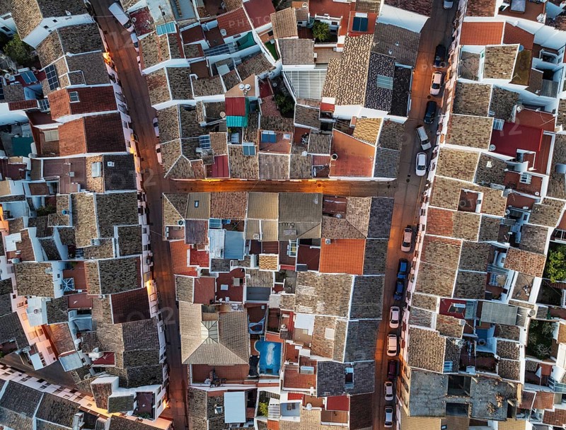 Streets and rooftops in the White Town of Olvera. Aerial view. Drone shot. Cádiz province, Andalusia, Spain, Europe