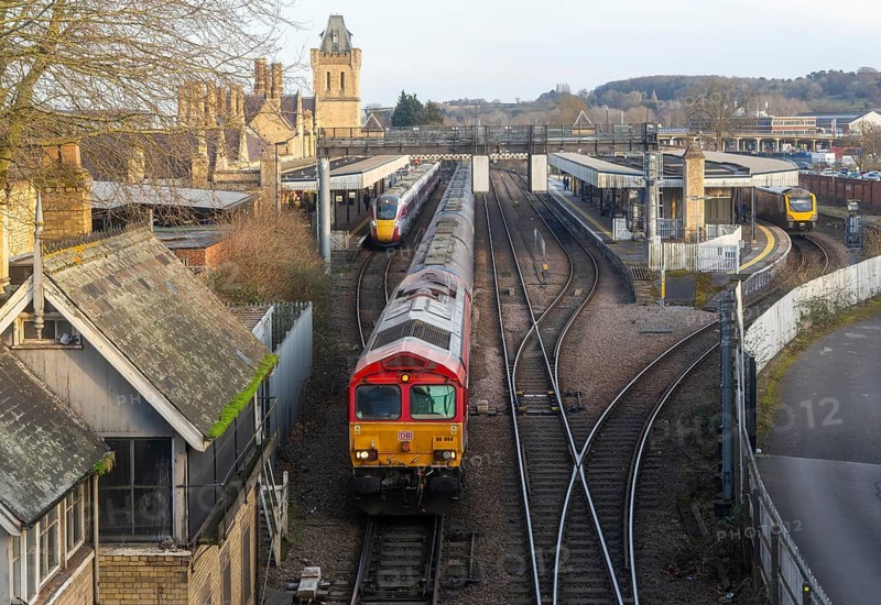 EMR British Rail Class 66 freight train and LNER Class 801 Azuma passenger train, Lincoln railway station, Lincolnshire, England, UK